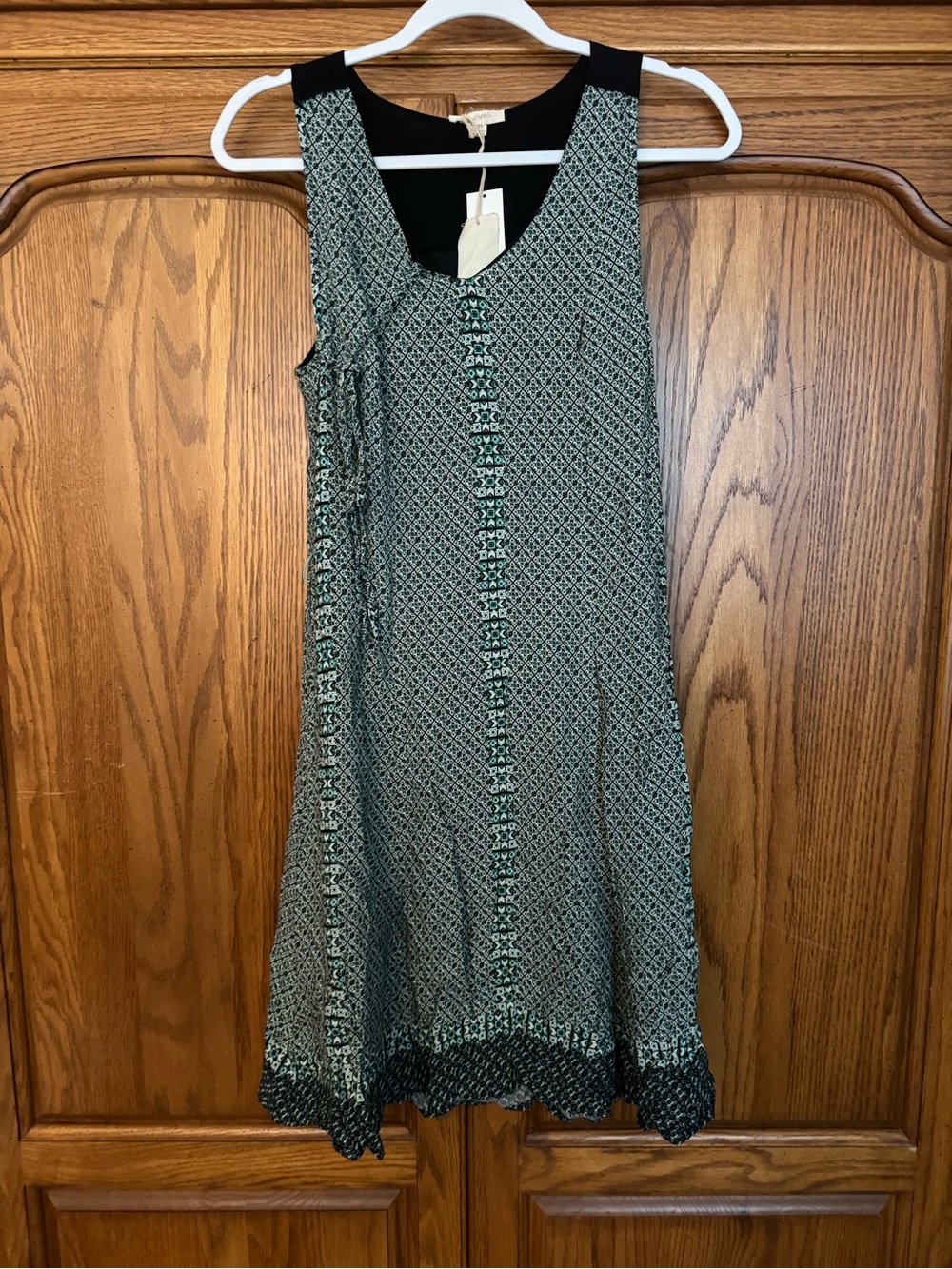 Sleeveless Printed Mini Dress in Teal and Black